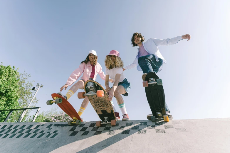 a group of people standing on a skateboard ramp