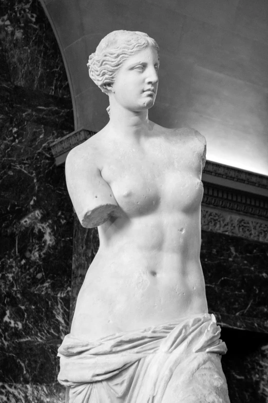 a statue of a woman with her  open