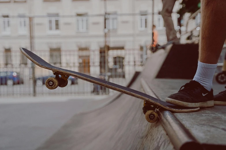 a person on a skateboard near a large building