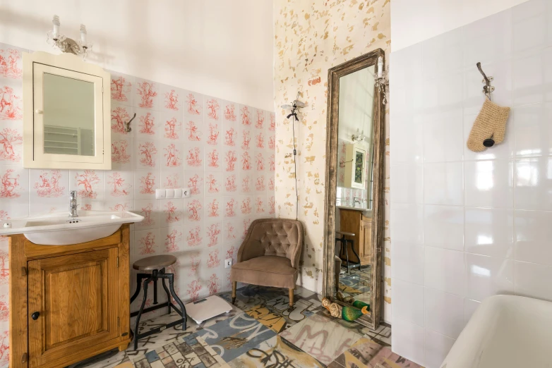 a bathroom with wooden cabinet next to the bathtub