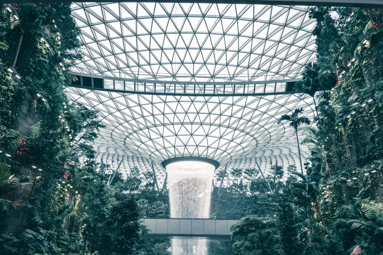 the inside of a building that has a pool in it