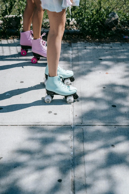 there are children riding on skateboards together