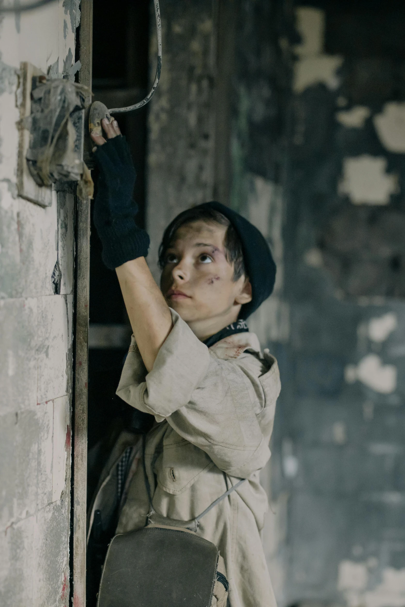 an image of a woman leaning up on a wall