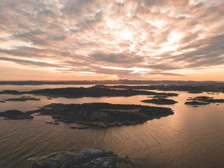 a view of the water, land and sky