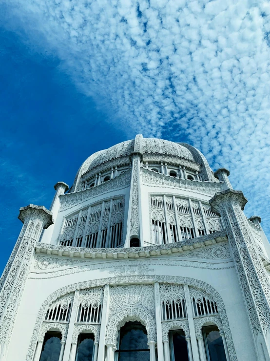 an ornate white building on a clear day