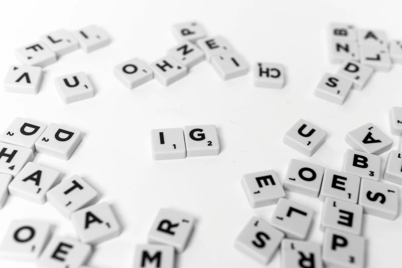 many letter tiles spelling the words that make letters come in all shapes