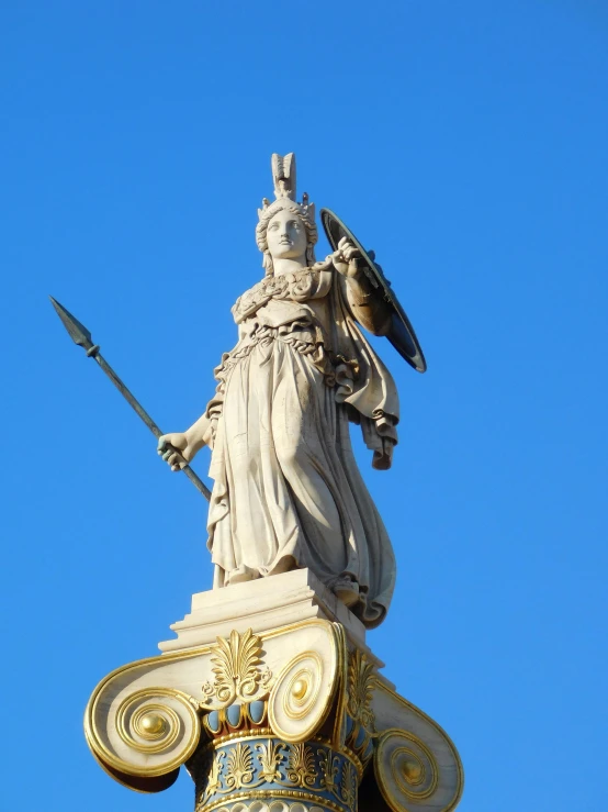 a statue with an eagle sitting on top of it