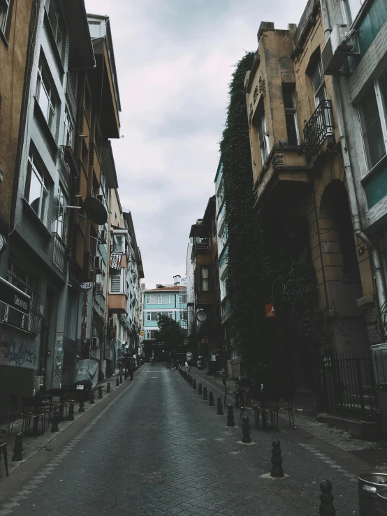 a long empty street with no cars parked on it