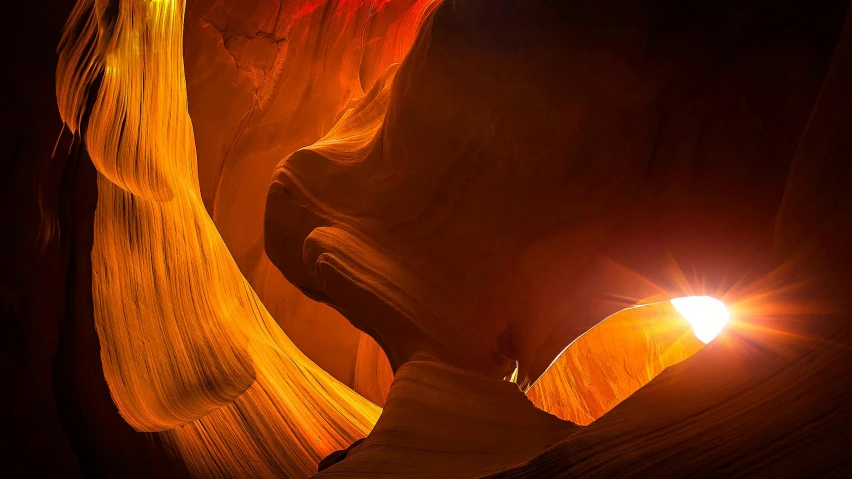 bright light inside a canyon with light at the end