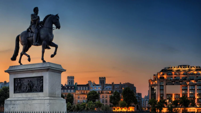 statue of a man on top of a horse