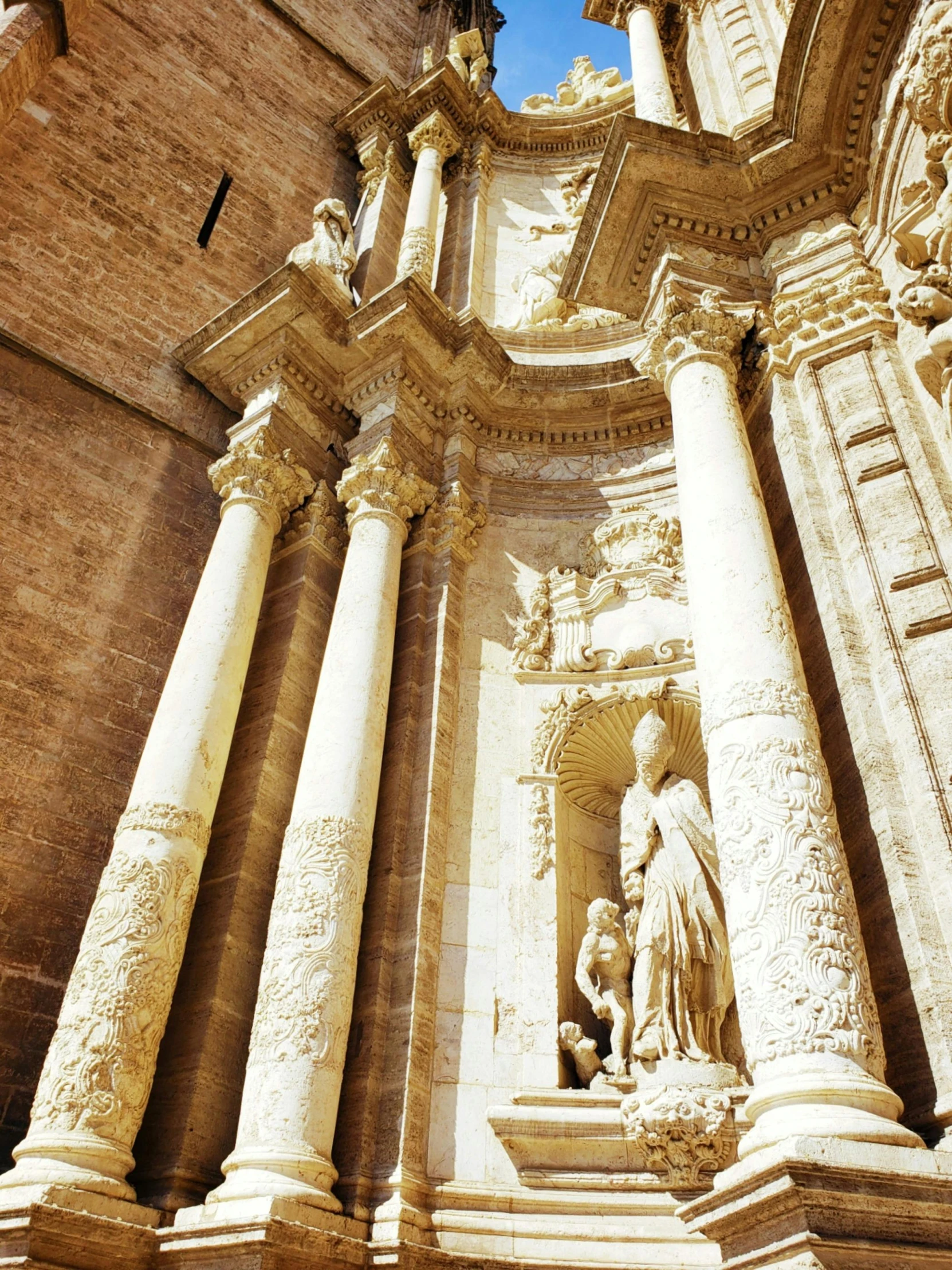 the architecture of a cathedral features ornate pillars