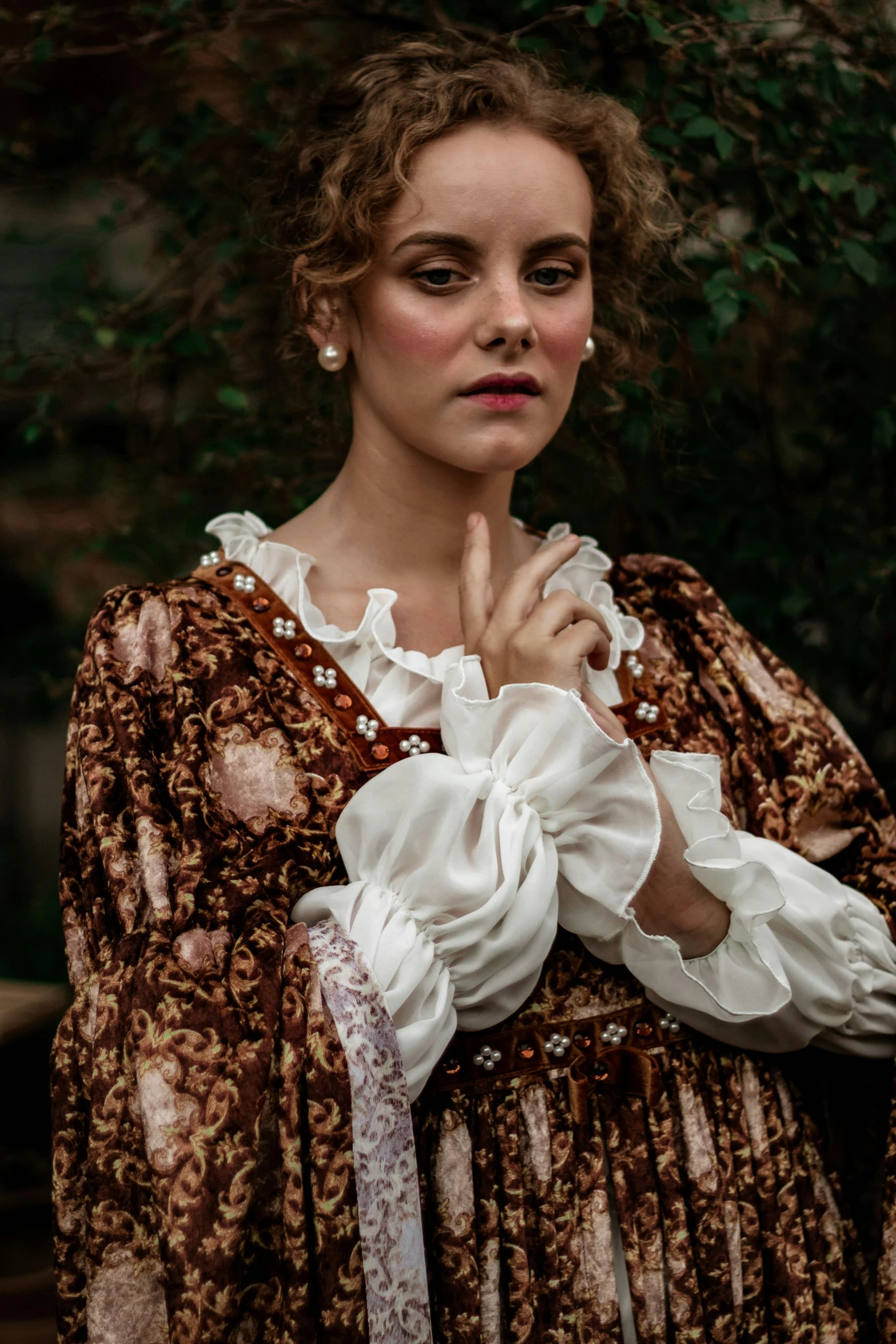 woman in victorian clothing posing for the camera