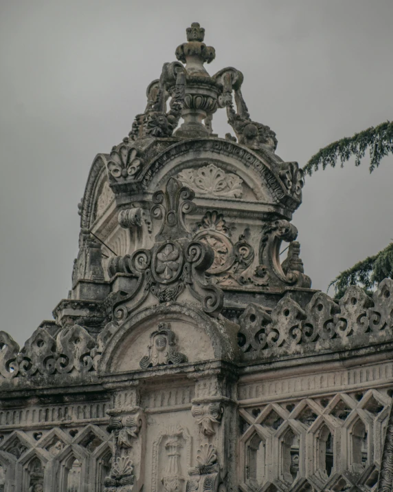 a clock tower with ornate carvings on it