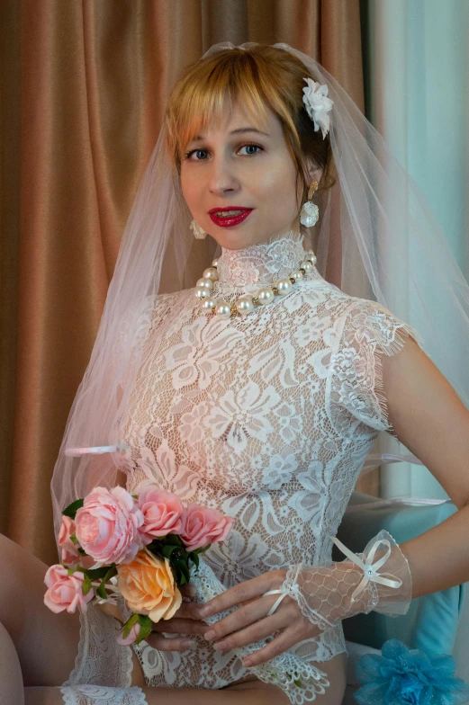 the woman in the white wedding dress is holding flowers