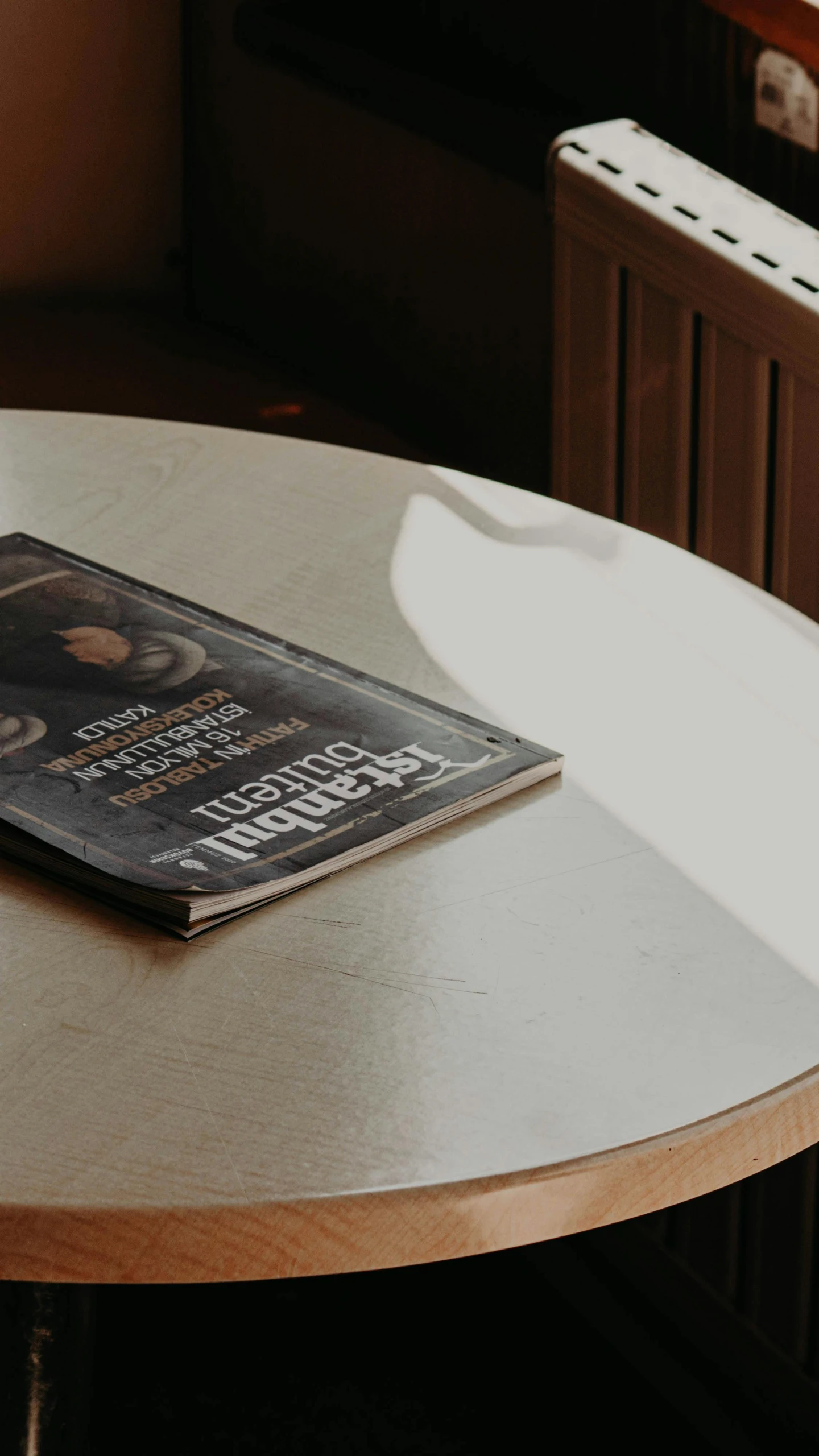 a book sitting on top of a white table