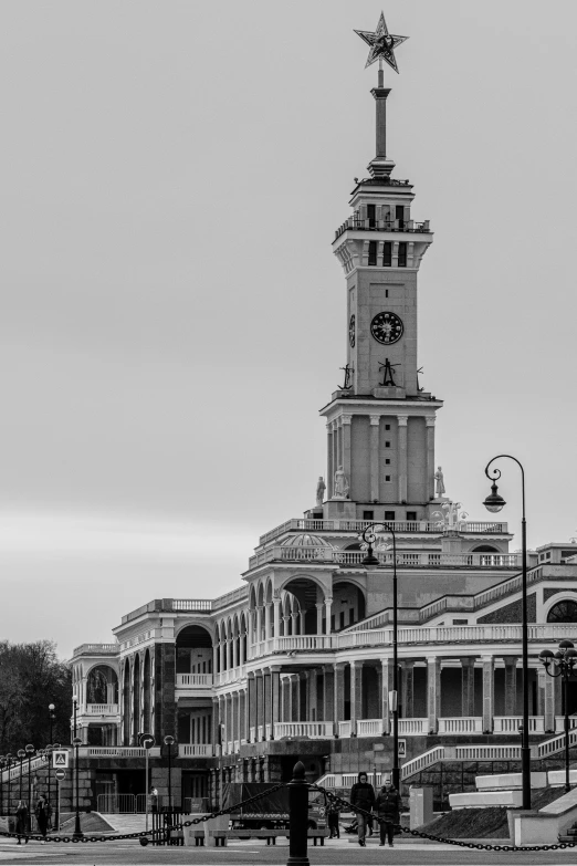 a black and white po of a large tower with a clock