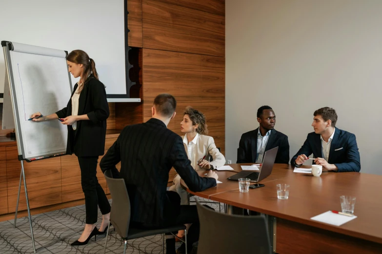 the business people are having an important discussion in the conference room