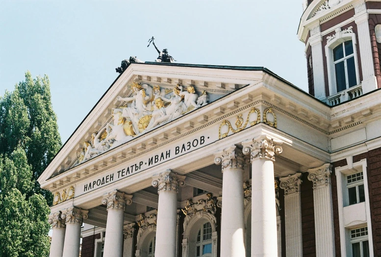 an architectural building with columns in front of it