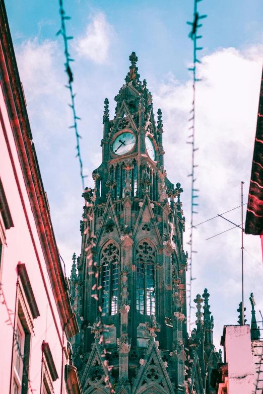 a church with a clock at the top of it