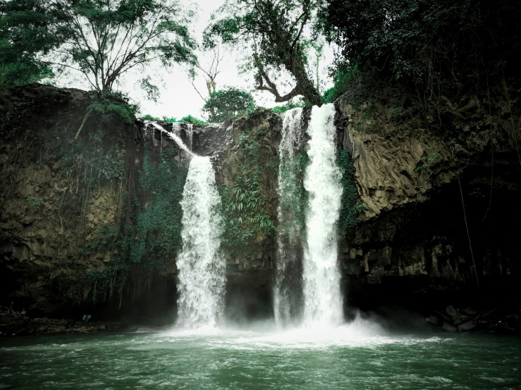 the waterfalls are falling into the water