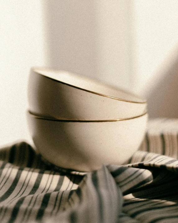 a white bowl sitting on top of a table