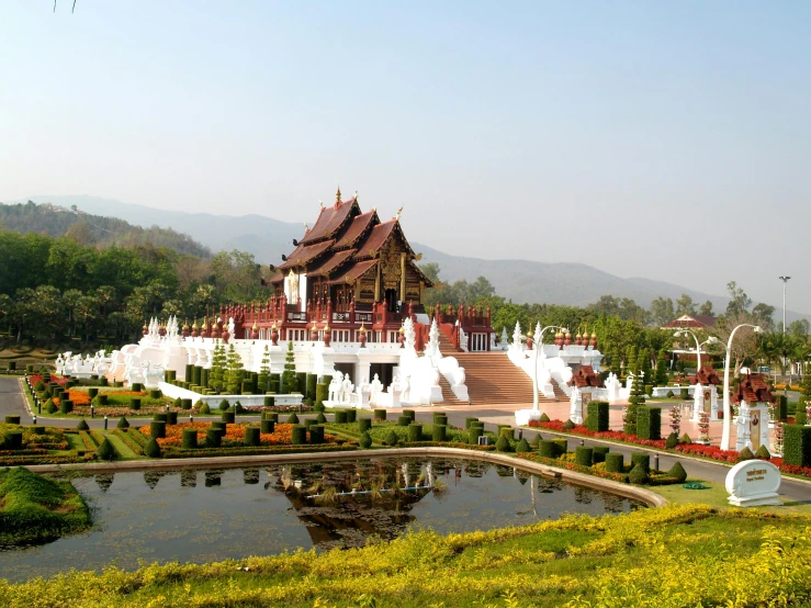 an architecturally decorated palace with gardens around it