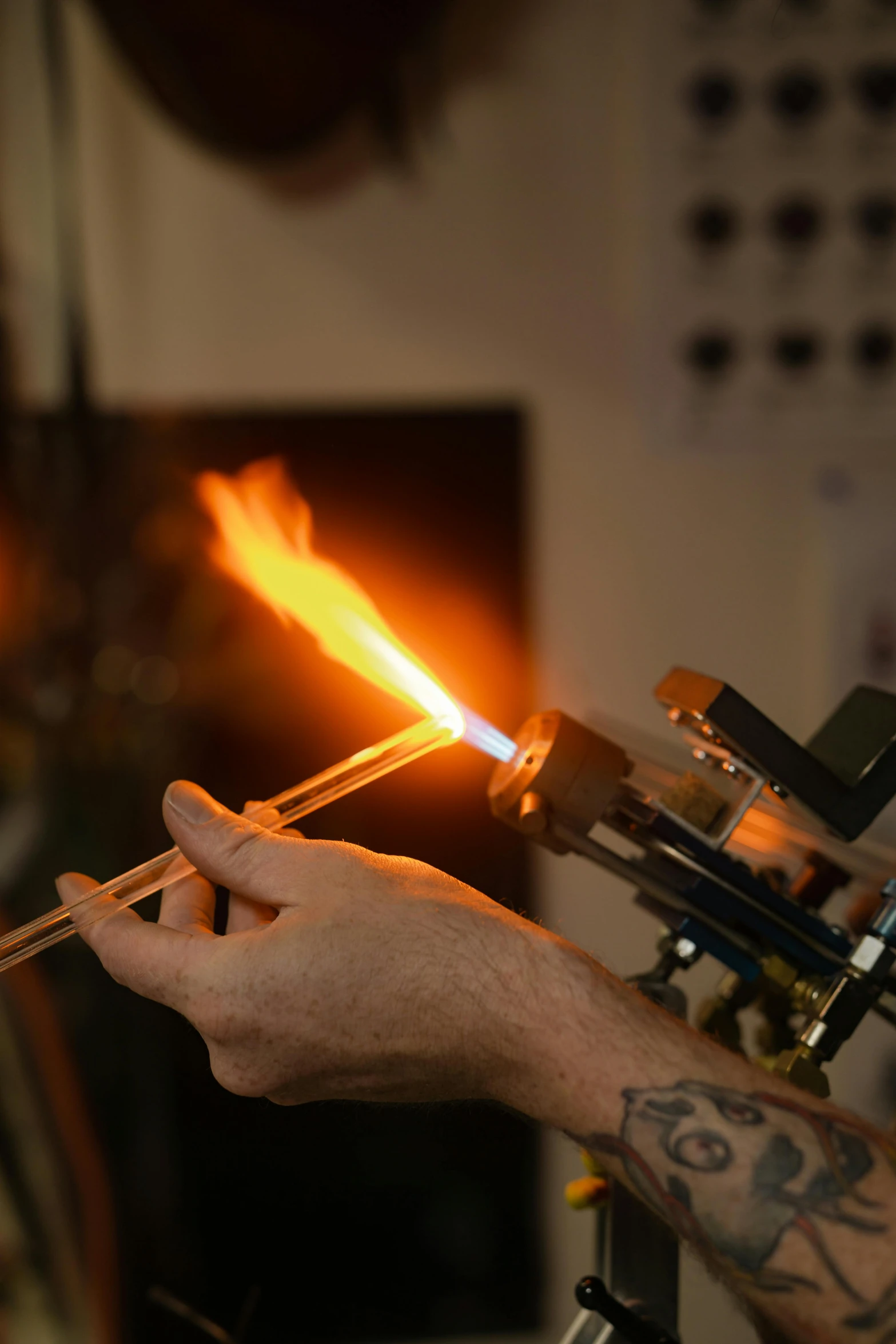 a man is working with thermiometer on fire