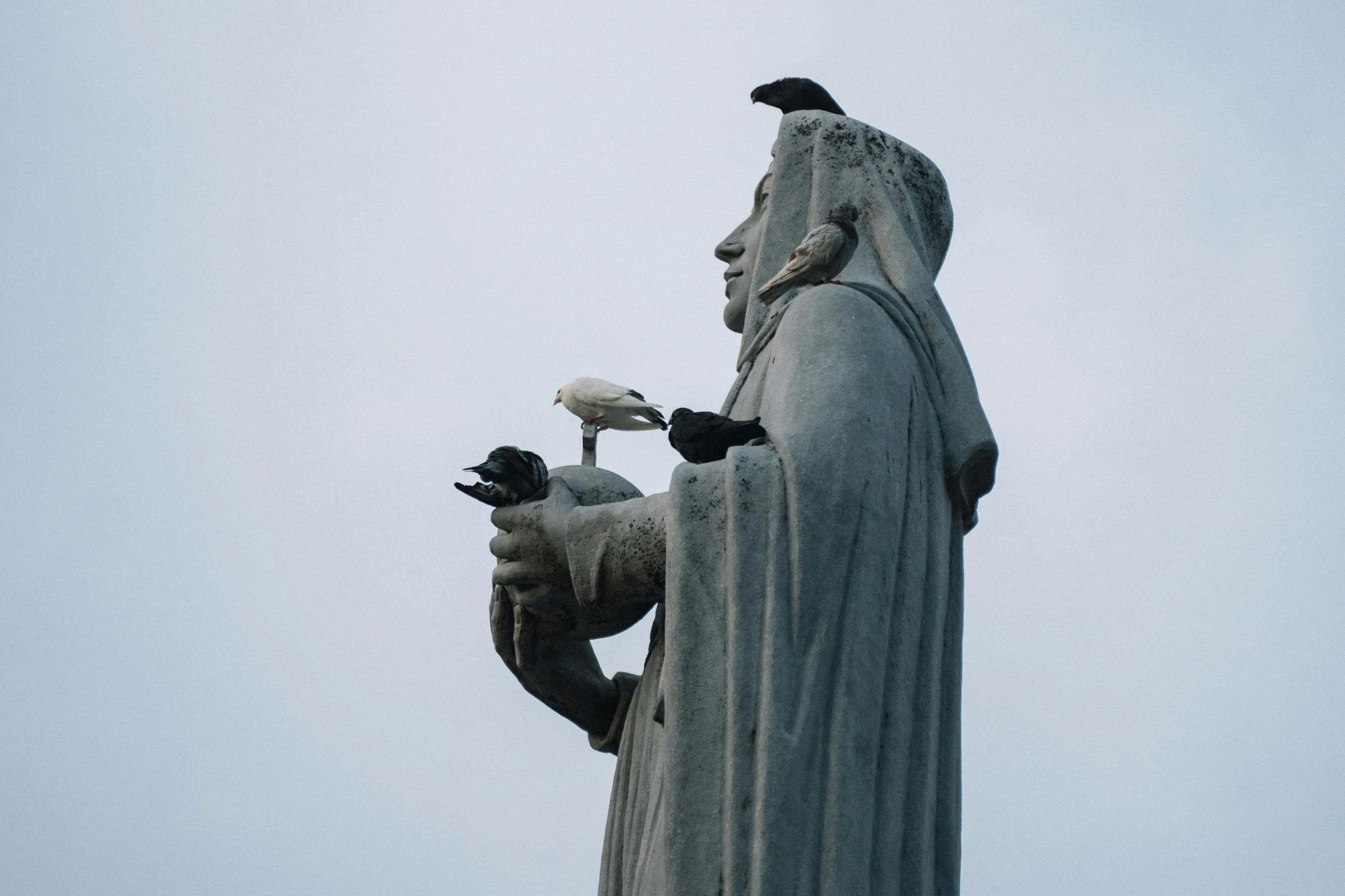 two statues on top of one another