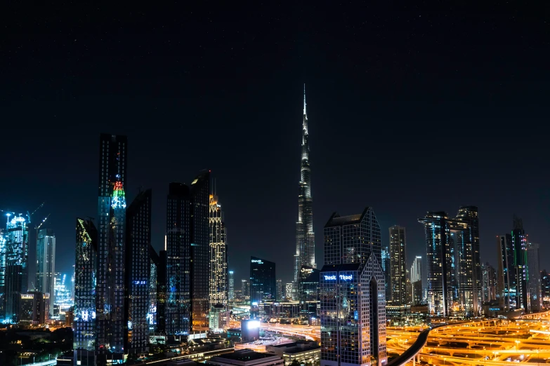 an illuminated city night scene from a high rise