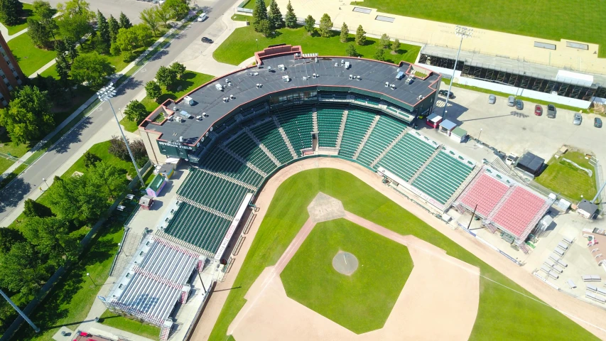 a baseball field from above with a baseball and other equipment