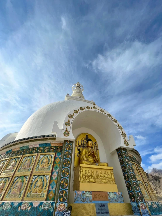 the dome on top of the building is painted with colorful designs