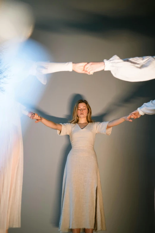 the women are standing in front of their shadow