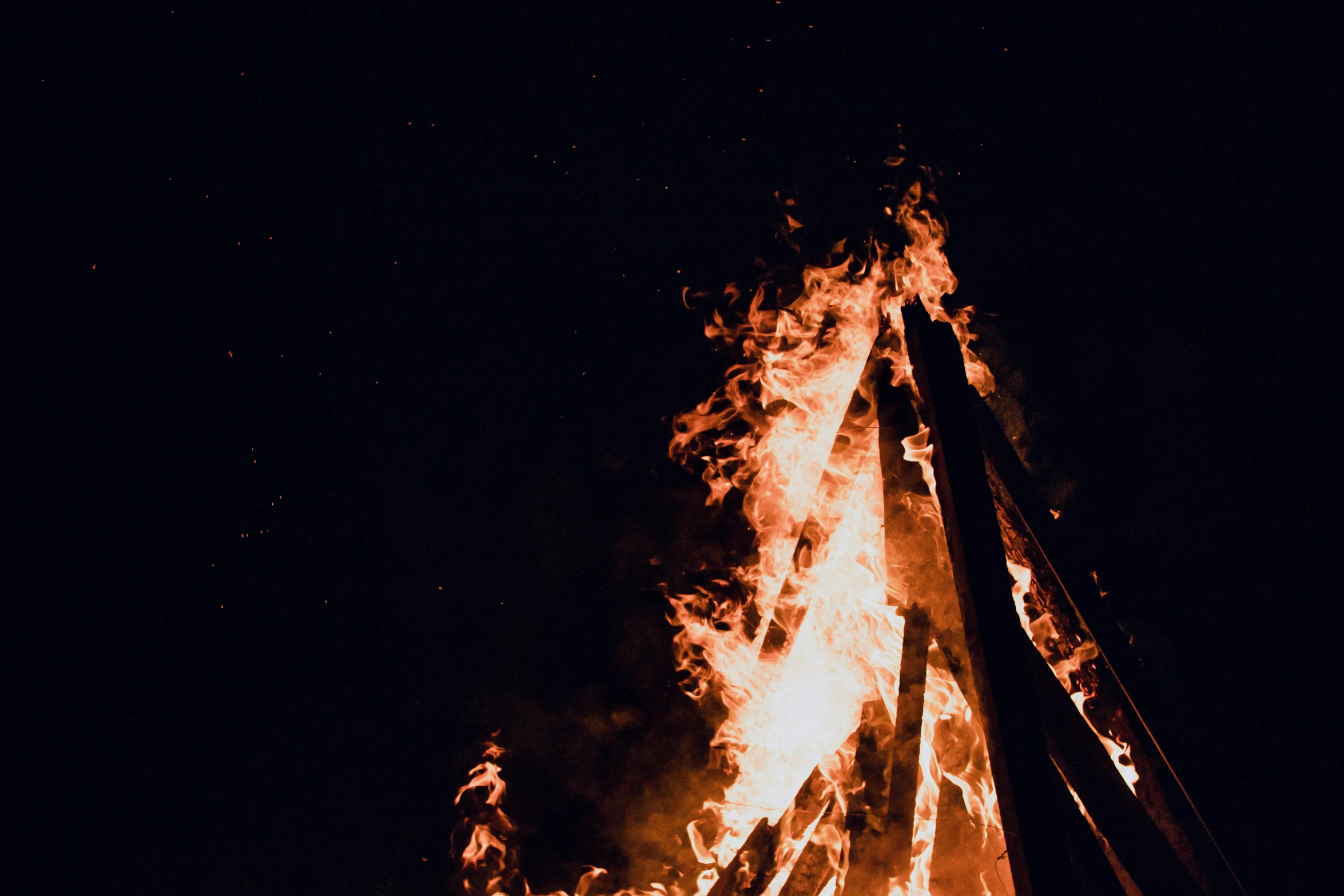 bright, open fire blazing over black background