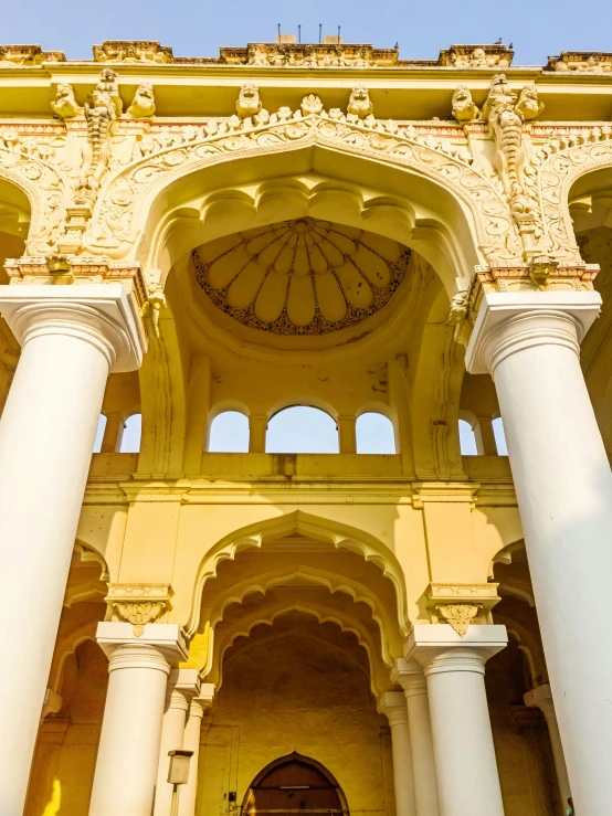 columns and arches at the entrance to an old building