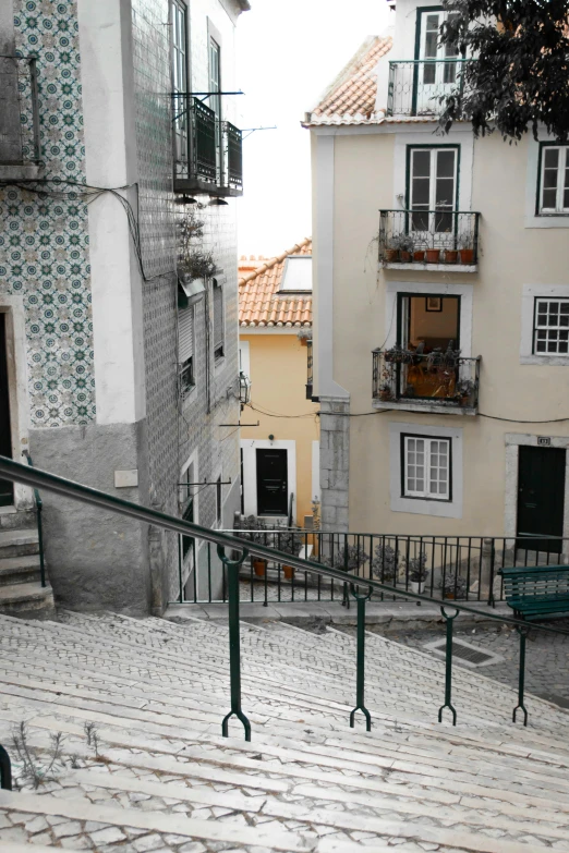 the stairs are in an old alley that leads up to the roof