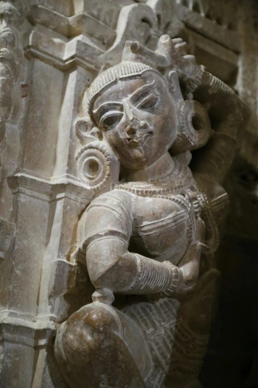 an ornate relief depicting hindu deities in relief