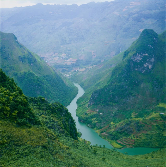 a view from a very high mountain to the river in front