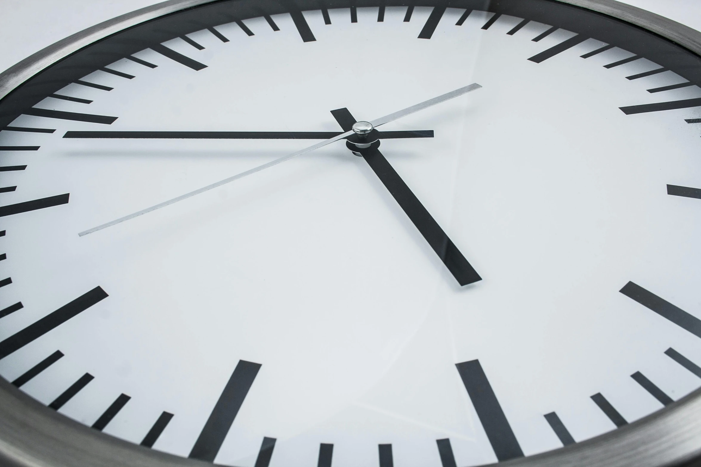 there is a large clock in front of a building