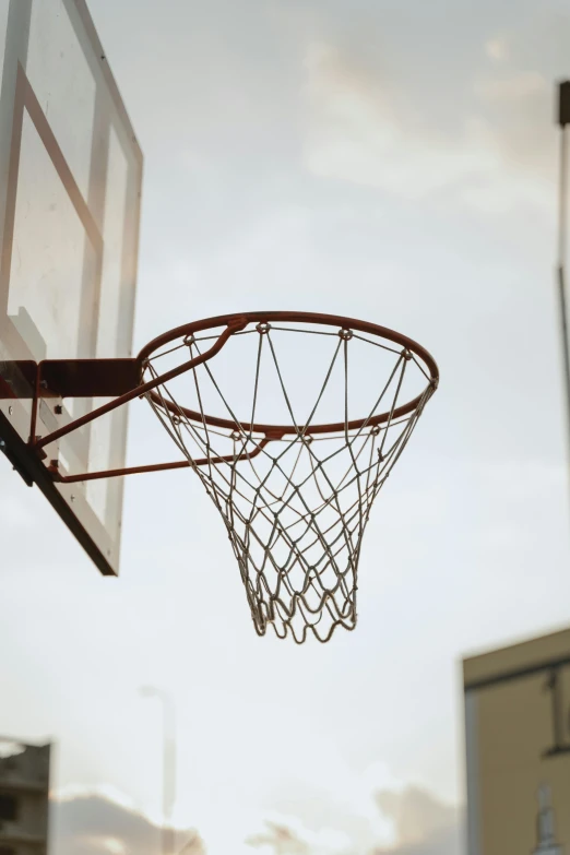a basketball is being hung on to a net