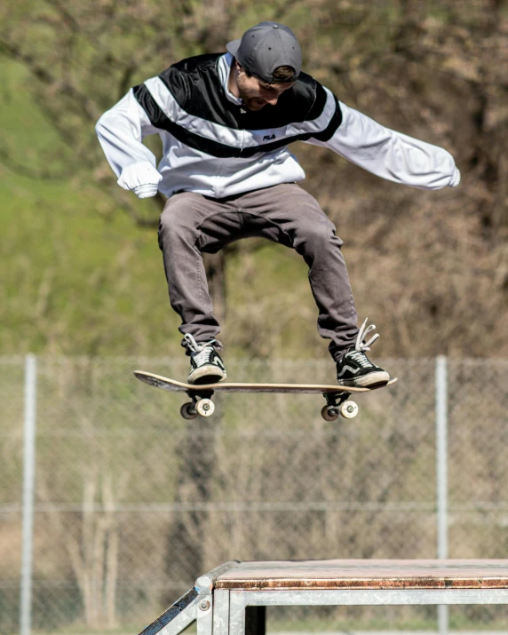 a man that is on a skateboard in the air