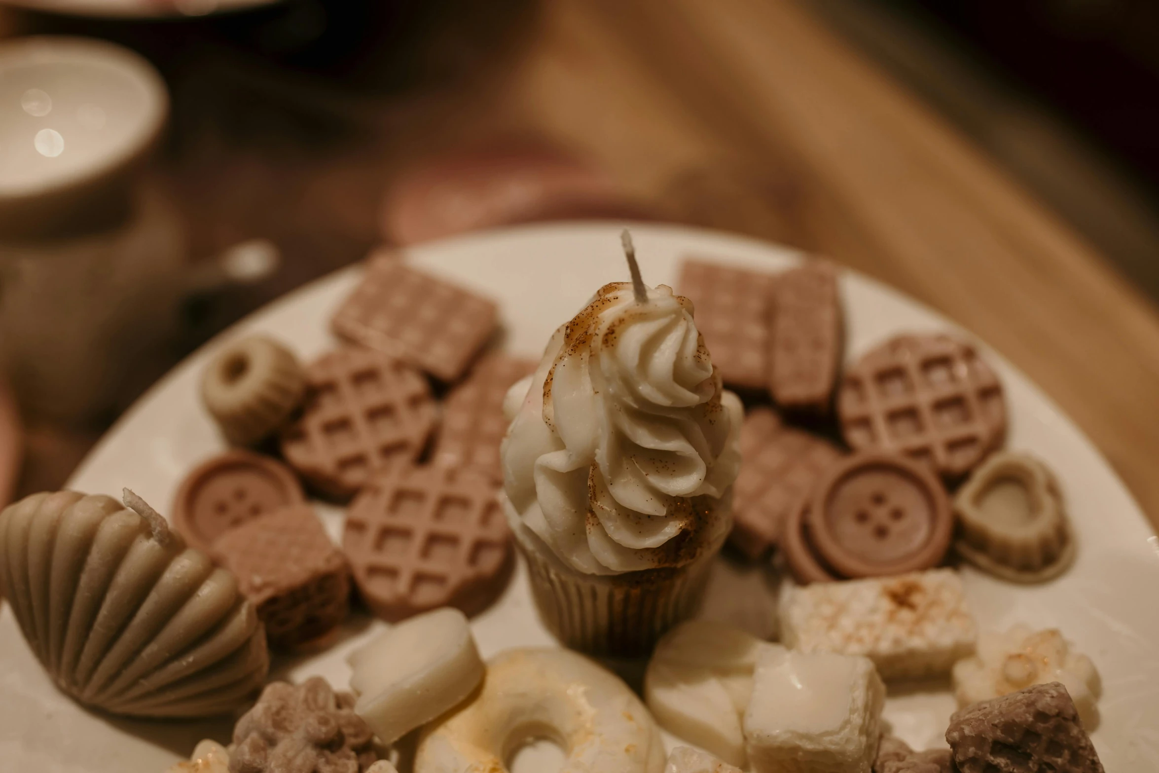 the small plate is holding different types of pastries