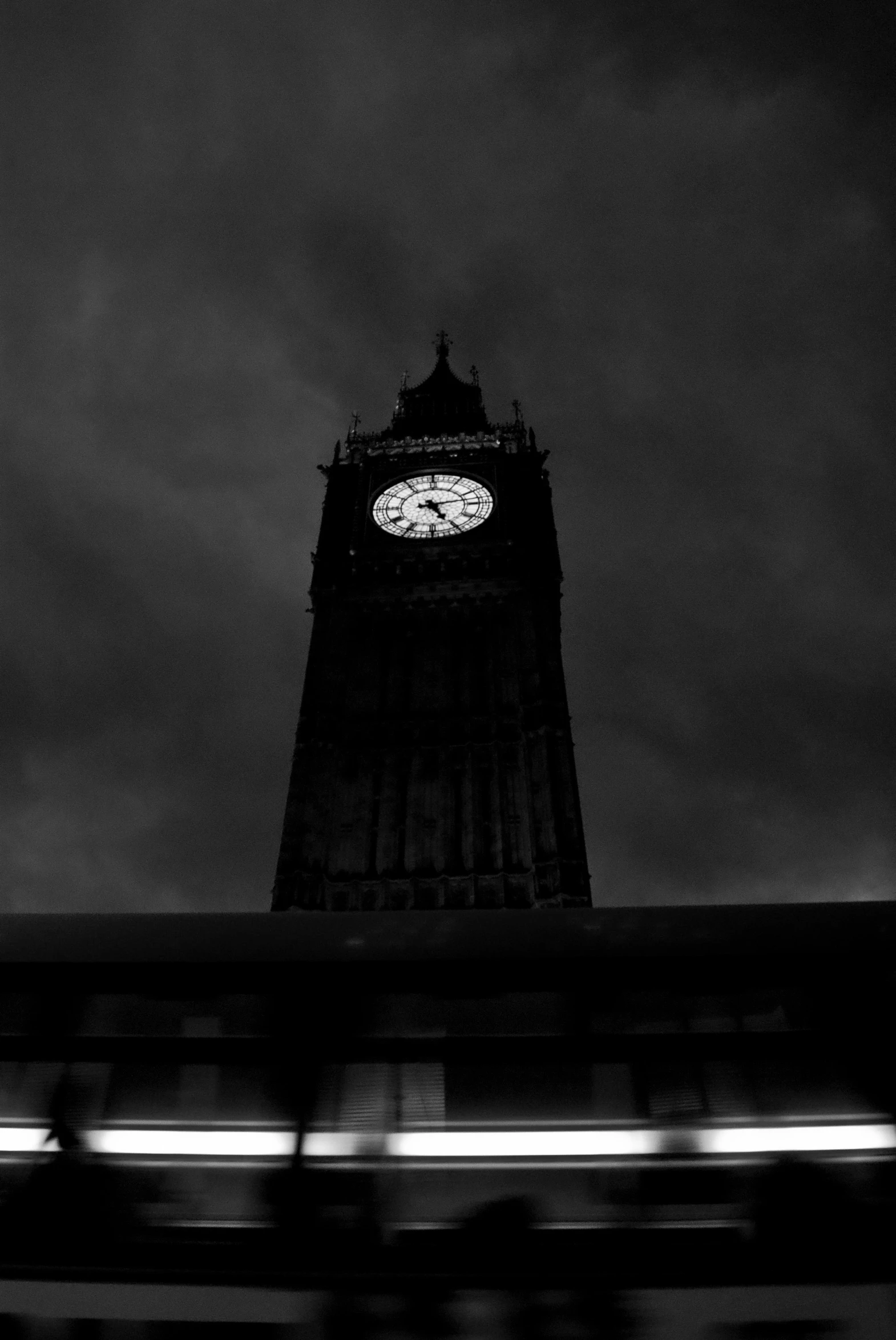 a black and white po of a clock tower