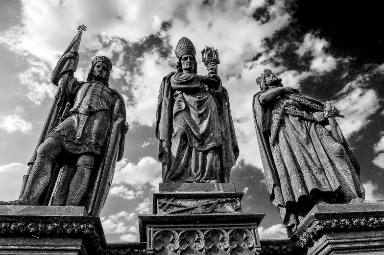 statues in the clouds on a cloudy day