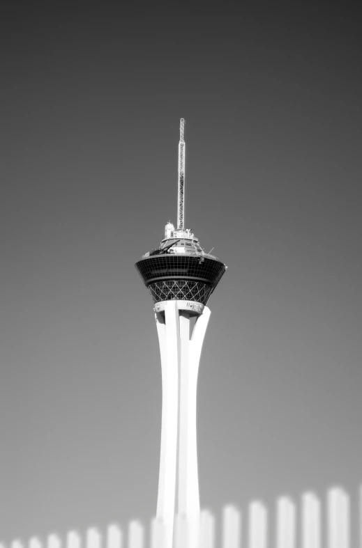 a tall building with a top on a sunny day