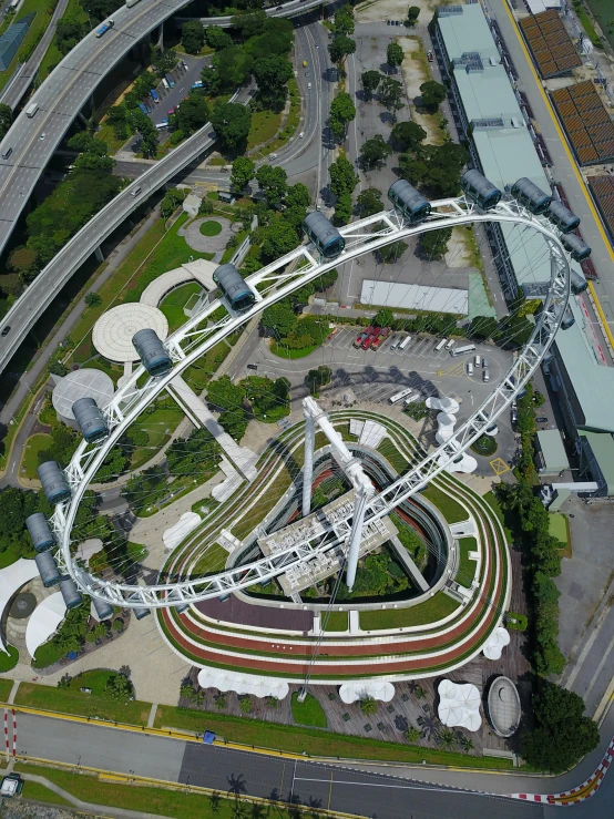 an aerial view of a city and roadway