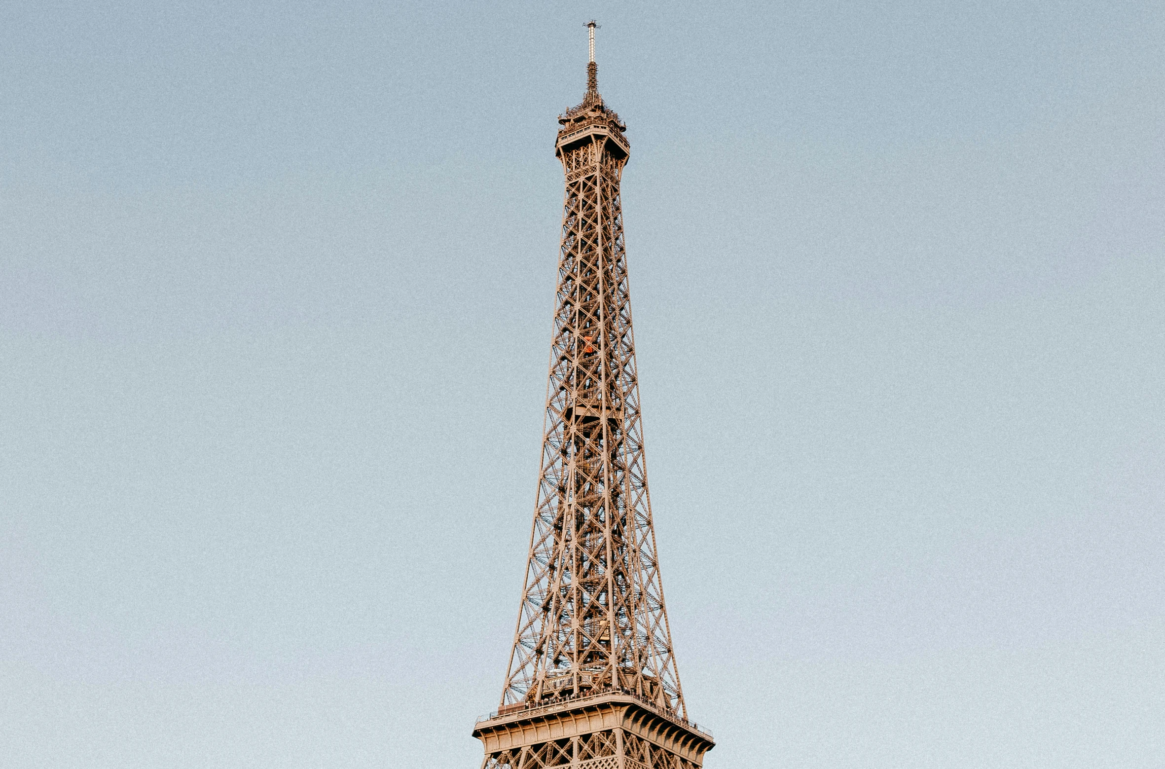 the eiffel tower is on a sunny day