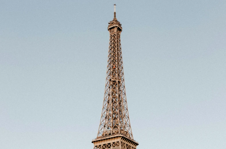 the eiffel tower is on a sunny day