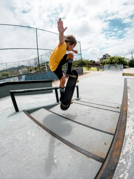 the young man is on a skateboard doing stunts