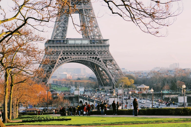 there is a tower with people standing around