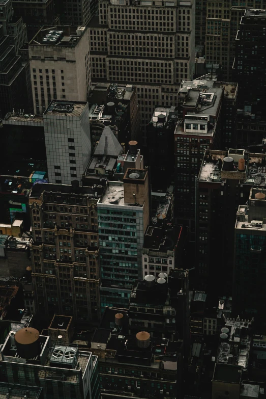 the sky view shows very tall buildings on both sides of this cityscape